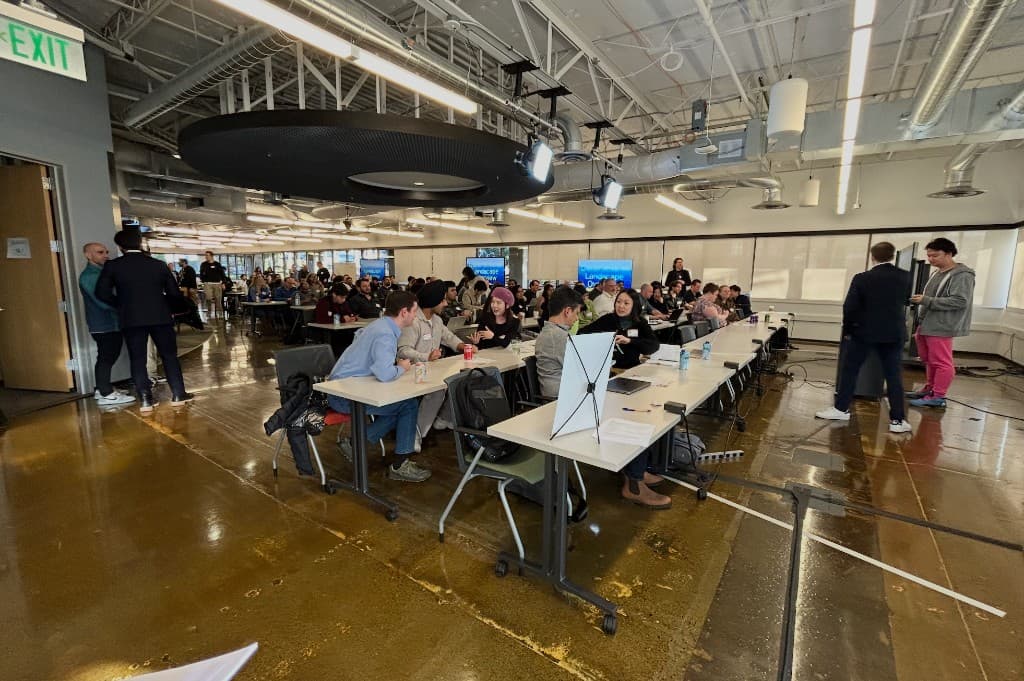 Large event space with tables and presentations